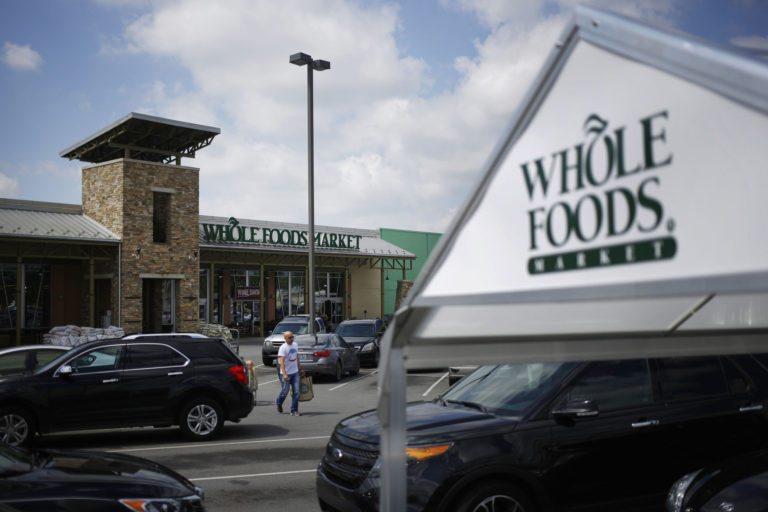 Whole Foods’ sales decline again, grocer cuts forecast