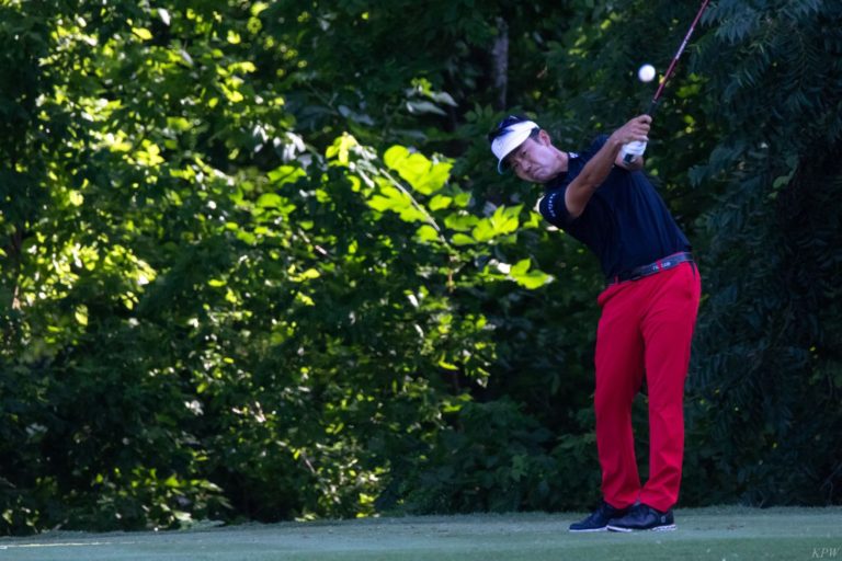 Na’s ending 90-foot chip to lead Colonial after first again