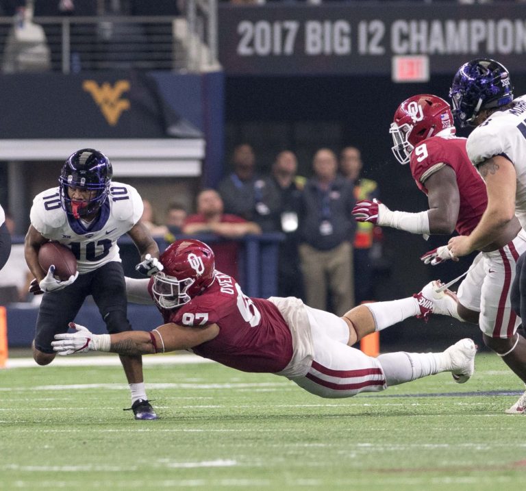 No. 2 Oklahoma stakes playoff spot, 41-17 over No. 10 TCU