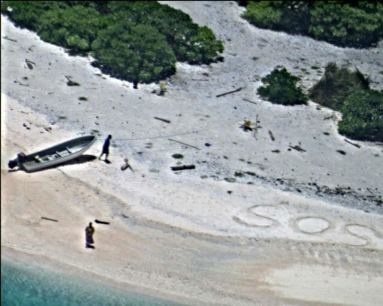 Stranded on remote island, they wrote ‘SOS’ in the sand. Luckily, search crews found them