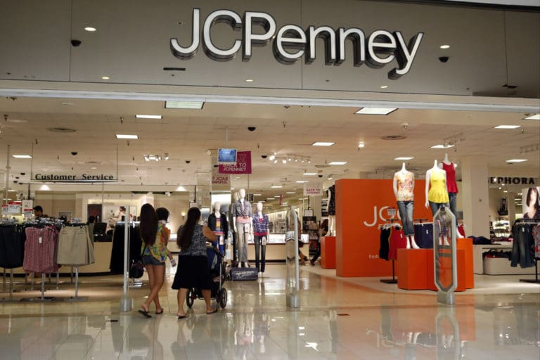 Losses at J.C. Penney double, sales slide, as do shares