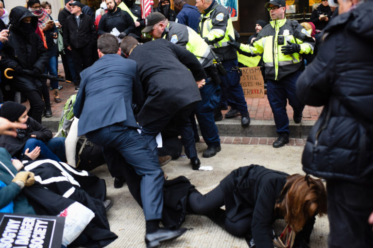 Protesters block entrances to inauguration, set fires, vandalize