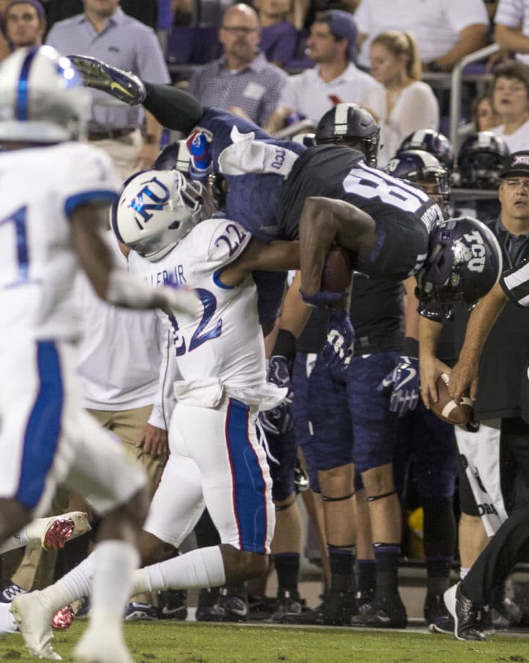 Hill, No. 4 TCU roll 43-0 as Kansas ties NCAA road loss mark