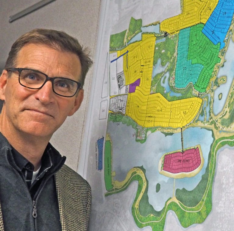 Two giant housing projects, one builder and an office staff of 12