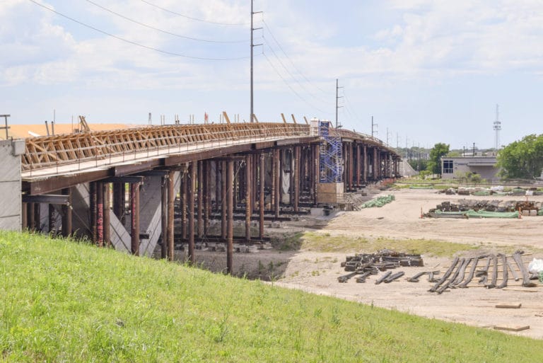 Bridge Battle: Contractor cites cost overruns, management for delays