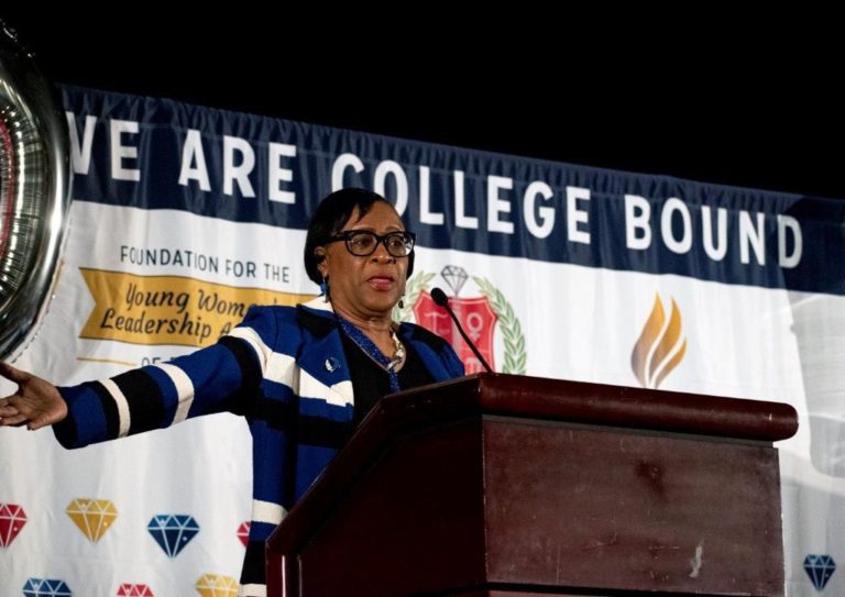 Dallas Mavericks CEO addresses Fort Worth YWLA graduates, presents laptops, apparel