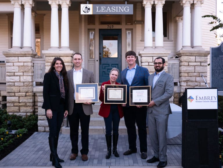 Embrey Partners honored for work on preserving, restoring historic Garvey House