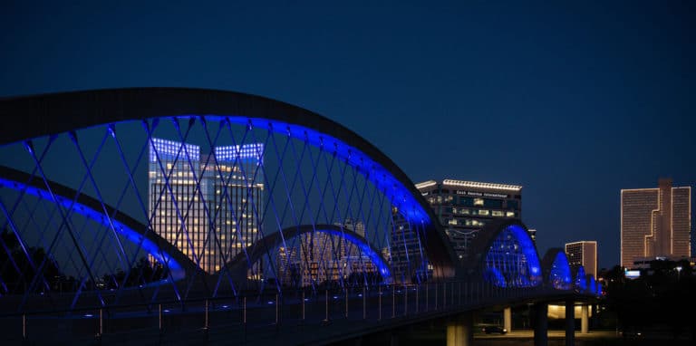 Vigil, bridge bathed in blue for slain Fort Worth officer