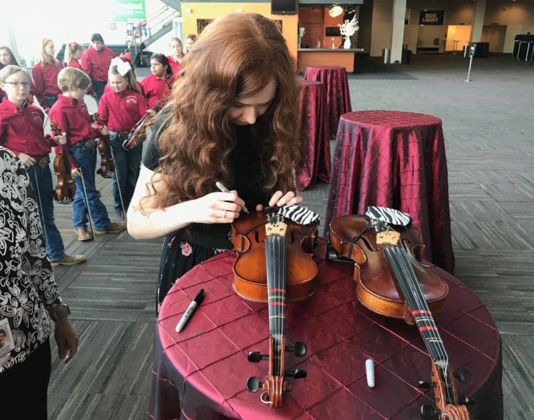 Grandview school string group meets with Celtic Woman group