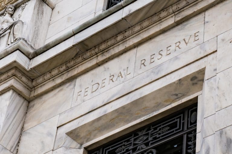 Fed to buy as much government debt as needed to aid economy