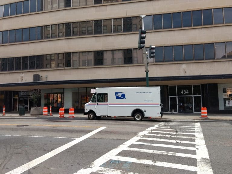 Lawsuit against Trump, postal chief seeks proper funding