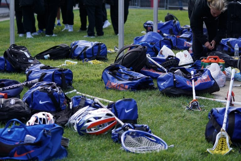 bagas and rackets on the grass