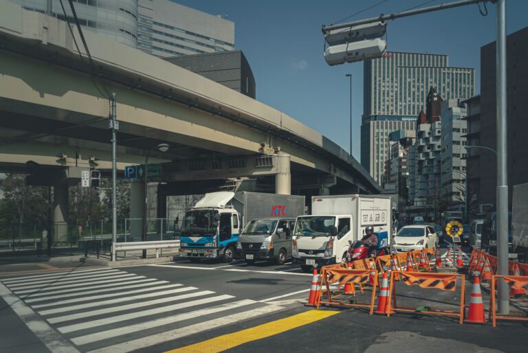 people in a city street during daytime