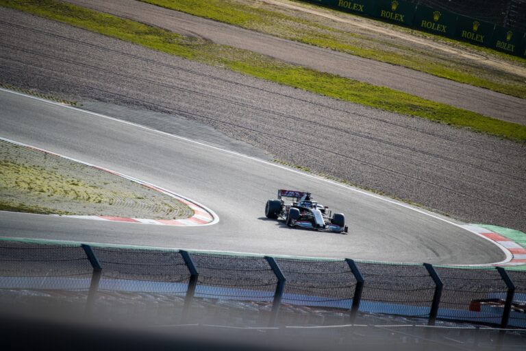 black f 1 car on track field during daytime