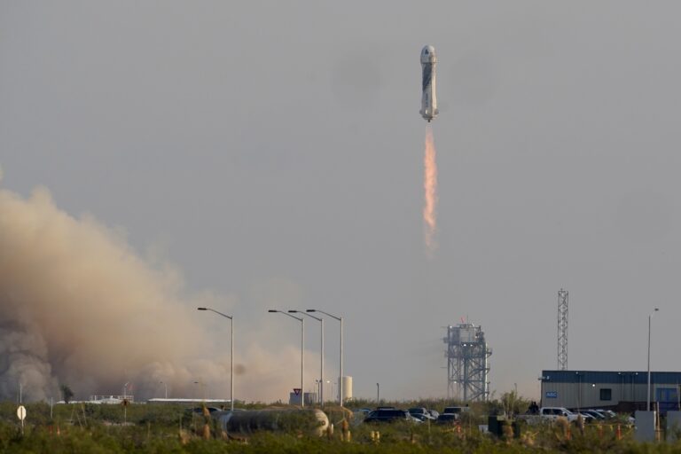 Bezos riding own rocket on company’s 1st flight with people