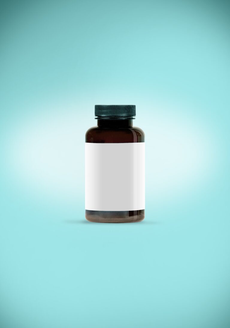 white and black bottle on white surface