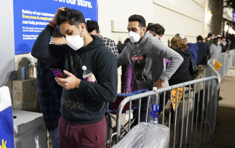 Stores kick off Black Friday but pandemic woes linger
