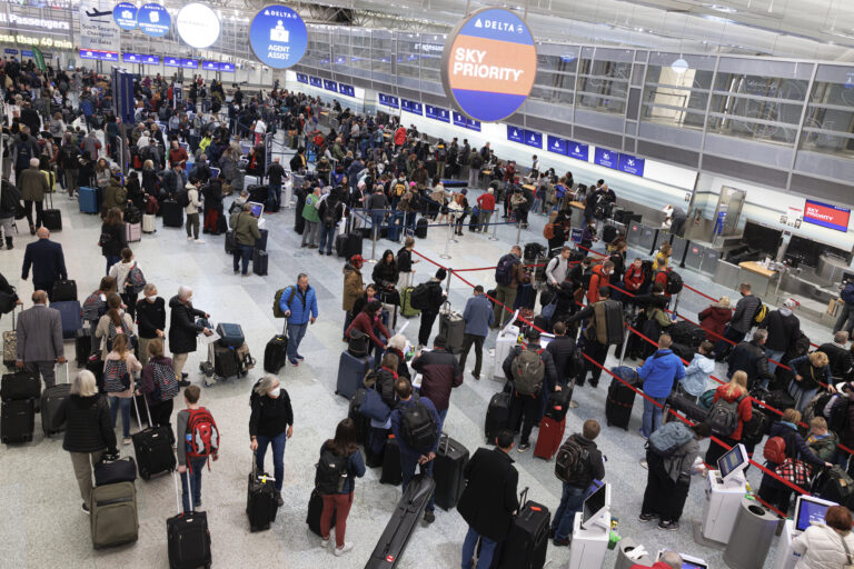 Snow, wind, freezing temperatures disrupt holiday travelers