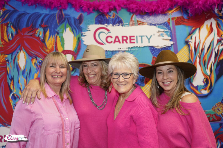 FORT WORTH STOCK SHOW STAFF SHARES HUMOR DURING SURVIVOR LUNCHEON  