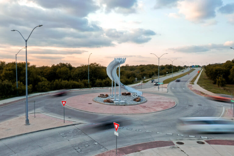 Announcing the dedication of Unfolding Time, a permanent site-specific public art exhibition curated by Iris Bechtol, featuring One Way by Leticia Bajuyo and A Very Long Now by Alicia Eggert