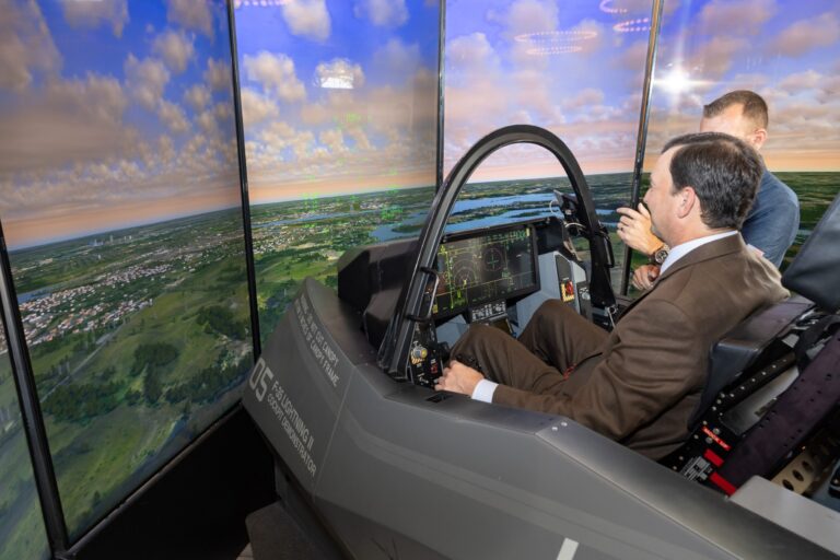 U.S. Rep. Craig Goldman takes flight in F-35 simulator during visit to the Aviation and Defense Capital of Texas